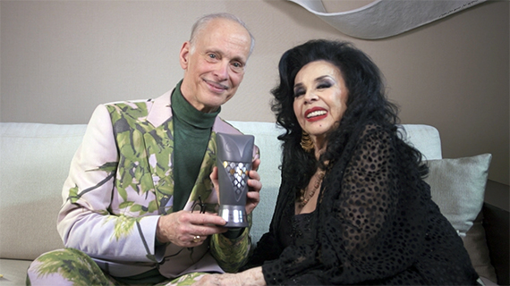 La Coca Sarli con el cineasta estadounidense John Waters